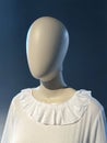 3D dummy photo of woman mannequin in a white dress with collar with studio light, blue and white Royalty Free Stock Photo