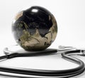 3d earth with stethoscope in white background