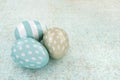 3d Easter glossy eggs lying on rustic table