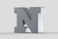 3D extruded uppercase letter N isolated on soft gray background.