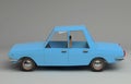 3d funny retro styled blue car.