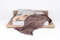 3d Furniture A modern leather brown king-size bed isolated on a white background Royalty Free Stock Photo
