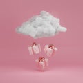 3D Gift box with cloud levitating on pastel pink background. Present with  gold ribbon falling from the sky. Abstract shopping com Royalty Free Stock Photo