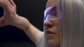 3d glasses woman swiping metaverse closeup. Gamer enjoying futuristic interface