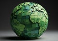 A 3D globe composed of interlocking green puzzle pieces, Royalty Free Stock Photo