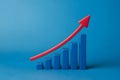 3D graphical representation of rising trend with blue bars and red arrow, indicating growth Royalty Free Stock Photo