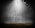 3D grunge room interior with spotlight shining down Royalty Free Stock Photo