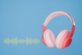 3d headphone with sound wave on blue background 3D render Royalty Free Stock Photo