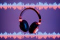 3d headphone with sound wave on blue background 3D render Royalty Free Stock Photo