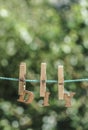 D.I.Y. word written by hanged wooden letters on rope at garden