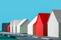 3d illustration small identical white one-story village houses stand in even rows on green grass.