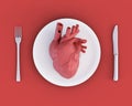 3d illustration of anatomical heart on plate, knife and fork. Concept of toxic relationship, heartbreak