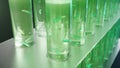 3D Illustration biofuel oil research in the laboratory, biofuel concept. Bacteria in the liquid inside the test tube as