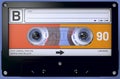 Black, orange and white audio cassette with sticker and label
