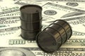 3d illustration: Black barrels of oil lie on the background of dollar money. Petroleum business, black gold, gasoline production. Royalty Free Stock Photo