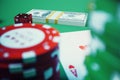 3D illustration casino game. Chips, playing cards for poker. Poker chips, red dice and money on green table. Online Royalty Free Stock Photo