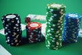 3D illustration casino game. Chips, playing cards for poker. Poker chips, red dice and money on green table. Online Royalty Free Stock Photo