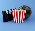 3d Cinema clapper board, Film reel and popcorn. Royalty Free Stock Photo