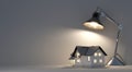 3d illustration of desk lamp and house on white table and grey wall.