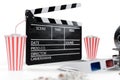 3D illustration, director chair, movie clapper, popcorn, 3d glasses, film strip, film reel and cup with carbonated drink Royalty Free Stock Photo