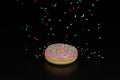 3d illustration of a donut with rain of colorful sprinkles