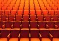 3d illustration of empty orange chairs in cinema theater