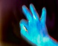 3D-Illustration of a glowing human male hand in an x-ray view Royalty Free Stock Photo