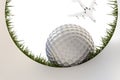 Golf ball approaching hole Royalty Free Stock Photo