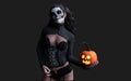 Halloween pumpkin or Jack-o`-lantern and scary ghost woman