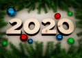 3D illustration 2020 Happy New year greeting card letters made of plywood and Christmas tree branches