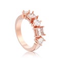 3D illustration isolated rose gold decorative ring with different round and square diamond with reflection Royalty Free Stock Photo