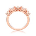 3D illustration isolated rose gold decorative ring with different round and square diamond with reflection