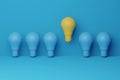 Light bulb yellow floating outstanding among lightbulb light blue on background. Concept of creative idea and