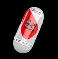 3d illustration of Mineral Se selenium red shining pill capsule. isolated black Royalty Free Stock Photo
