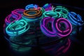3d illustration neon donuts nestled among other geometric shapes, each glowing in a different neon hue