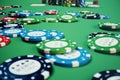 3D illustration playing chips, cards and money for casino game on green table. Real or Online casino concept.