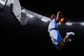 3d illustration professional basketball player slam dunk on sport arena