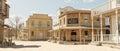 3D illustration render of an empty street in an old wild west town with wooden buildings Royalty Free Stock Photo