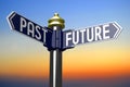 Future, past - time concept - signpost with two arrows Royalty Free Stock Photo