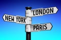 London, New York, Paris - travel concept - signpost with three arrows