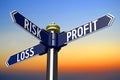 Risk, profit, loss - finance concept - signpost with three arrows Royalty Free Stock Photo