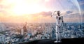 3D illustration robot humanoid looking forward against cityscape skyline