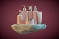 3d illustration of set of diverse cosmetic containers in pink color standing on white rock pedestal over dark red