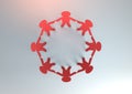 3D illustration of silhouette of people united as red paper cut out and holding hands in a circle. Top view Royalty Free Stock Photo