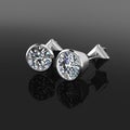 3D illustration silver diamond earrings on black background.