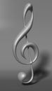 3D Illustration. Silver treble clef on white material
