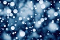 Snow falling from the night sky, blurry photorealistic image. Generative AI