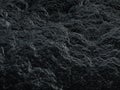 3d illustration, texture of rough black volcanic stones