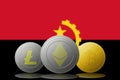 3D illustration Three cryptocurrencies Bitcoin Ethereum and Litecoin with Angola flag on background