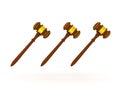 3D illustration of three golden gavels